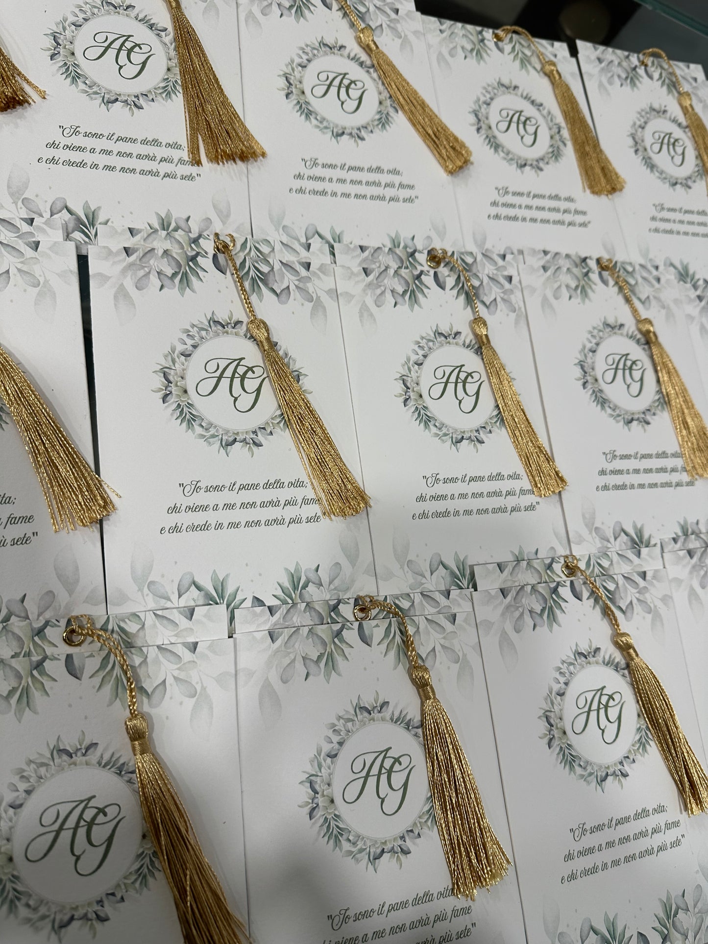 Invito a portafoglio con nappina green